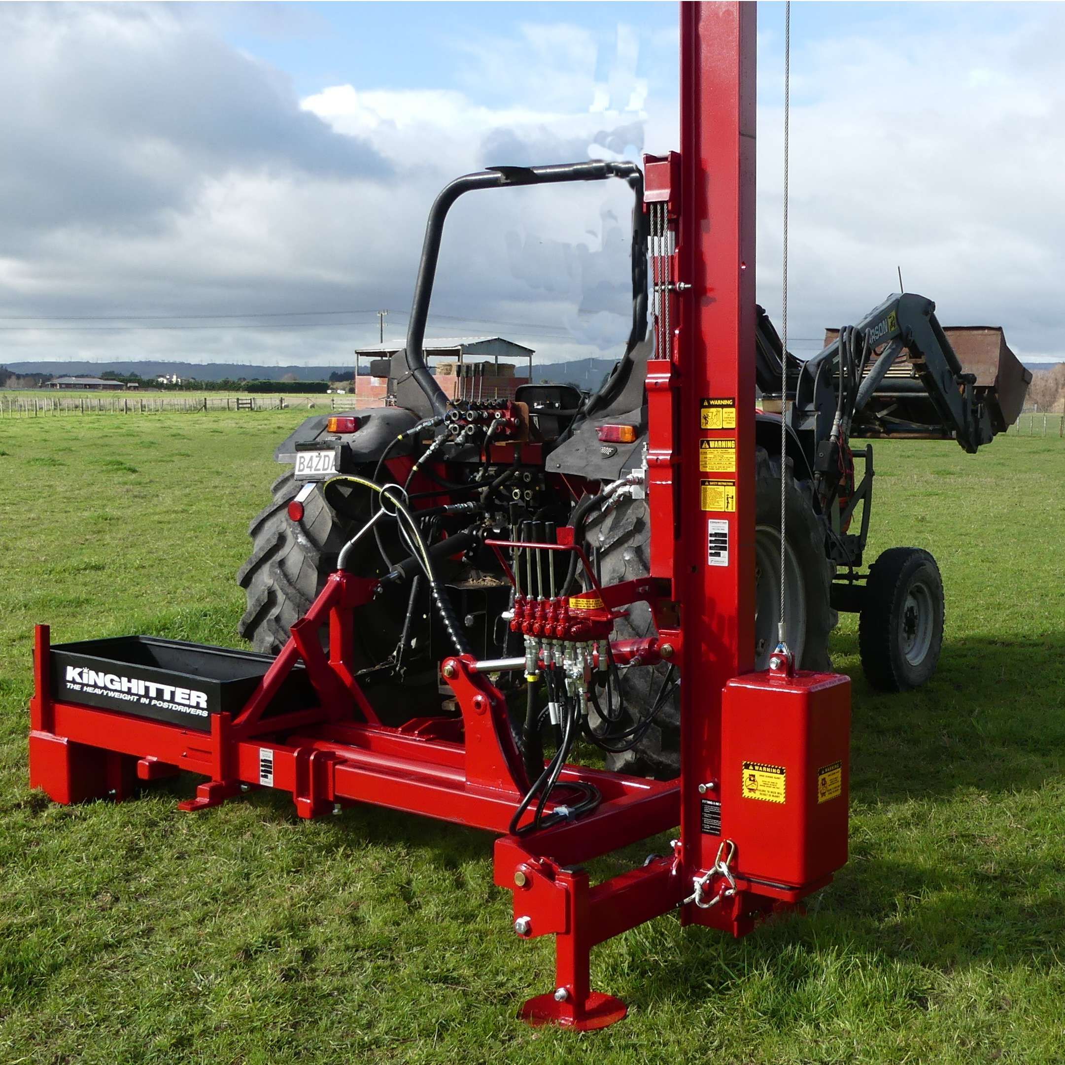 Red painted Kinghitter Series 2 post rammer with black toolbox on Terminator Base on SAME tractor